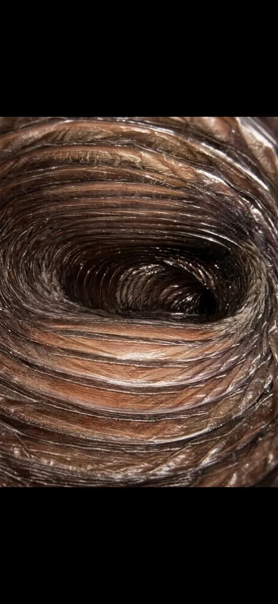 After: same flexible duct cleaned with portable HEPA negative-air system