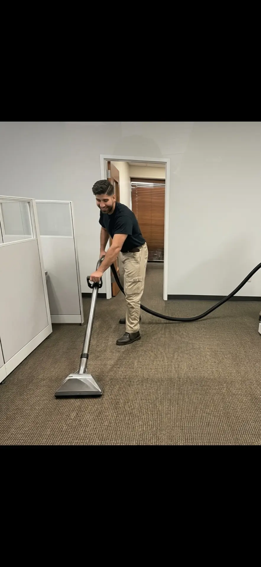 ASAP Pro technician extracting water from a commercial office floor in Oklahoma City