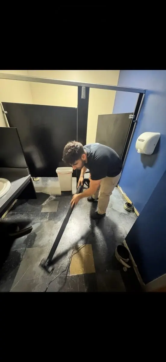 HEPA vacuum extraction during biohazard decontamination